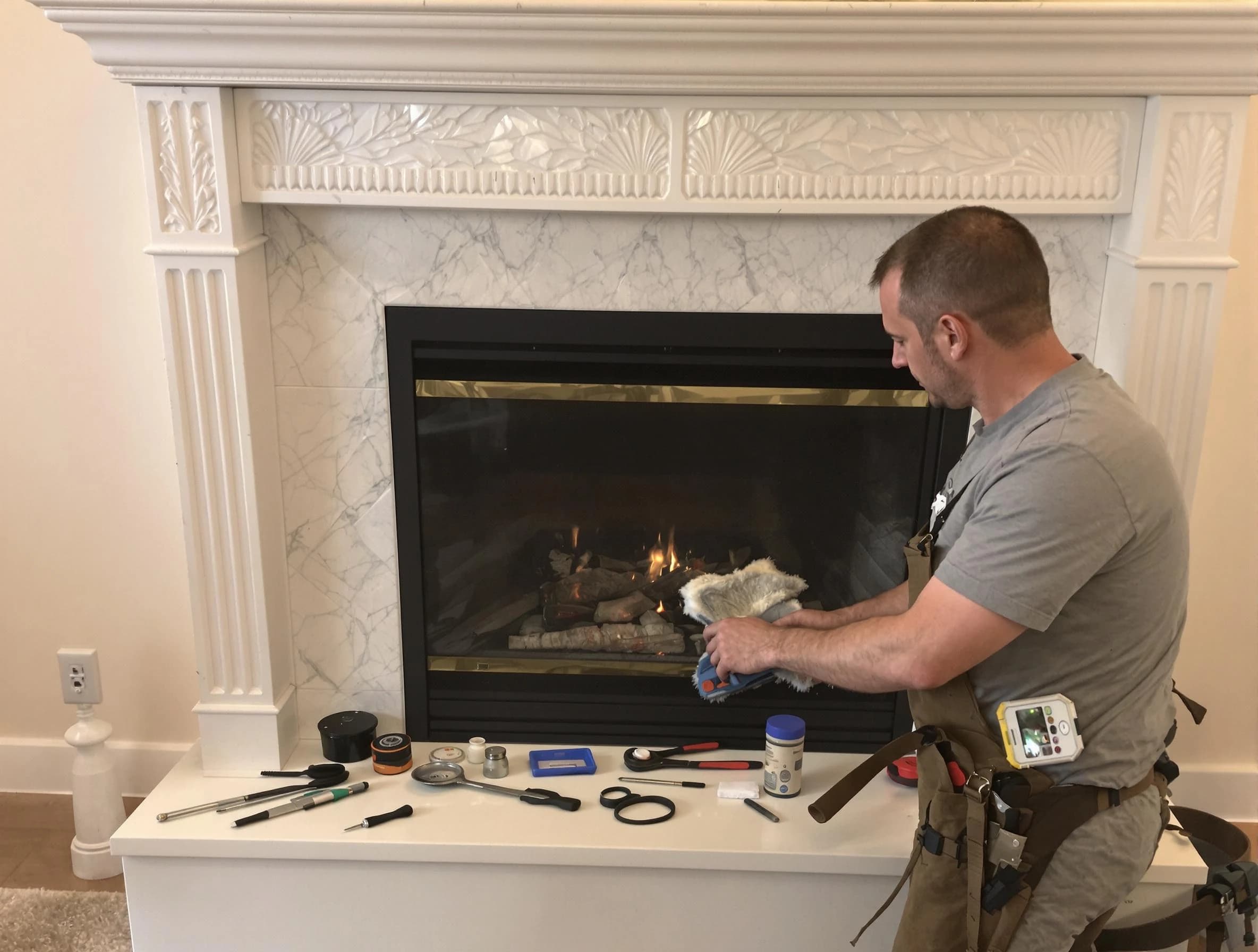Pleasant View Chimney Sweep performing fireplace maintenance in Pleasant View, UT