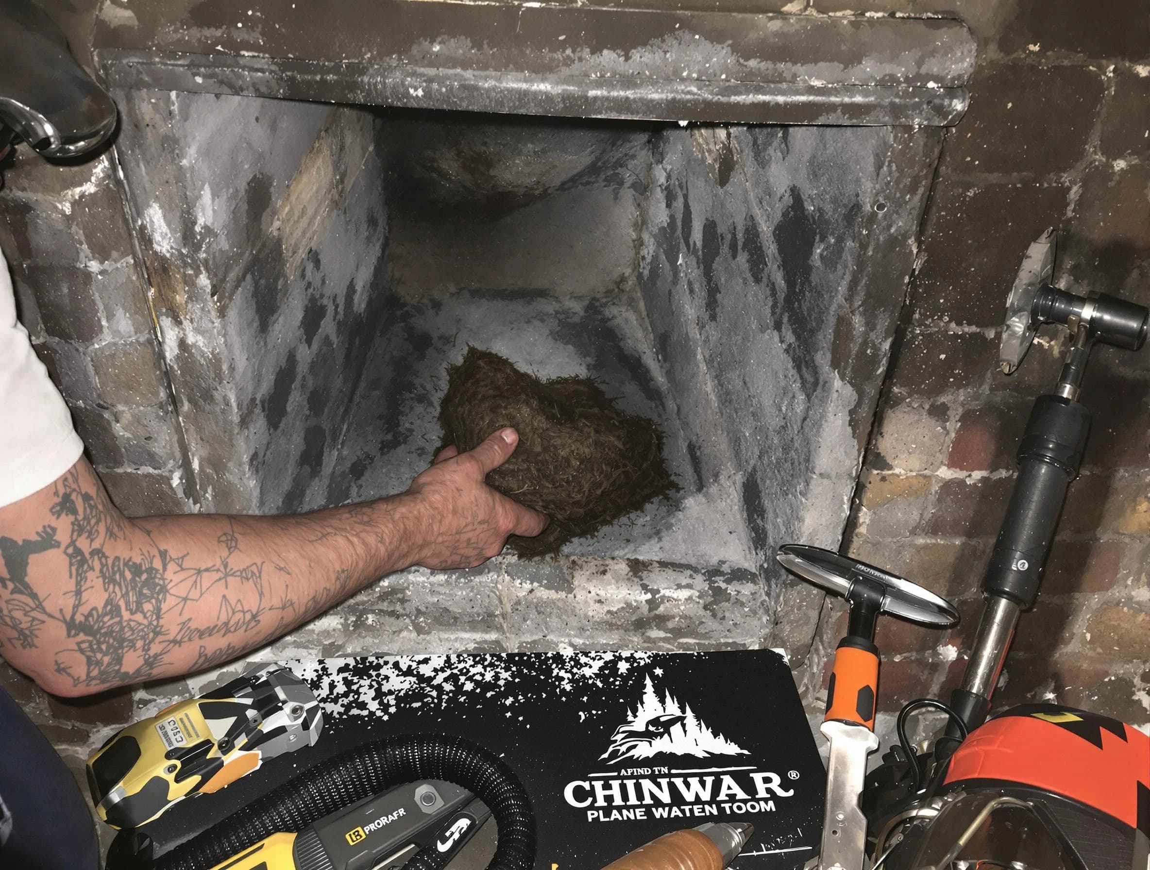 Pleasant View Chimney Sweep safely removing debris and screening chimney in Pleasant View, UT